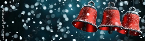 Three festive red bells hang against a snowy backdrop, evoking a joyful holiday spirit and winter celebration. photo