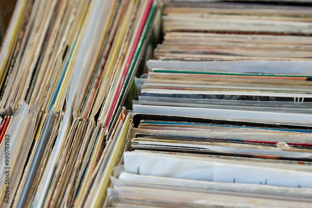 Close up of box of '7 inch singles' vinyl records inside house