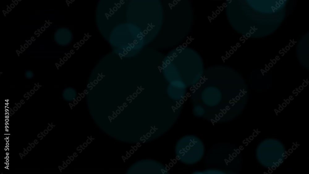 Beautiful loop floating moving big blue blurred bokeh bubbles lights motion on black abstract Background. Blue bokeh particle on black background.