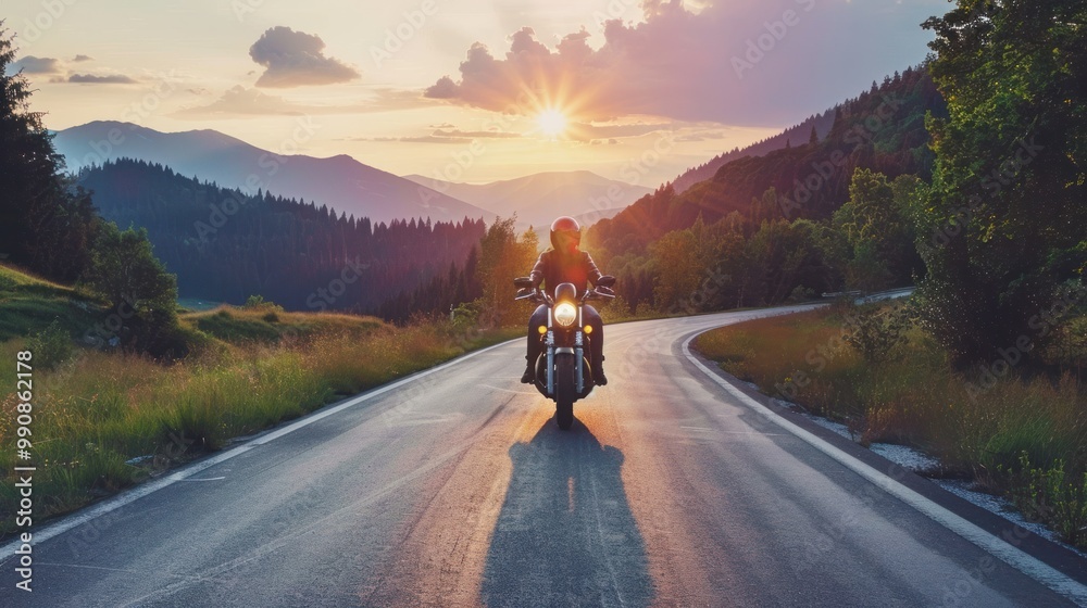 photograph of A motorcyclist rides his motorbike on a beautiful paved road through a summer forest, being the only rider on a beautiful road surrounded by summer forest and mountains and sunset sky. photograph of A motorcyclist rides his motorbike on a beautiful paved road through a summer forest, being the only rider on a beautiful road surrounded by summer forest and mountains and sunset sky.
