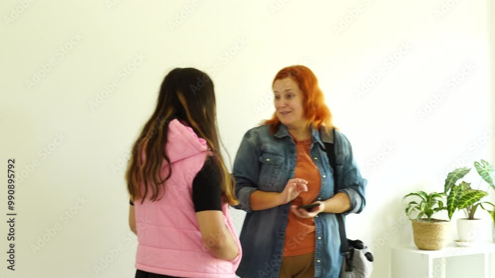 Mother talk with daughter in the morning before school Mother talk with daughter in the morning before school
