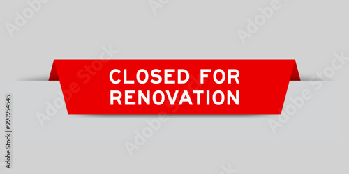 Red color inserted label with word closed for renovation on gray background