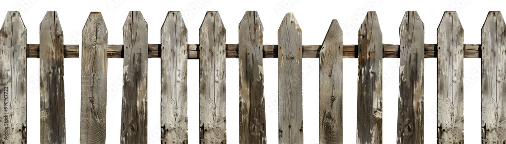 A weathered wooden fence with a rustic appearance, suggesting age and character. A weathered wooden fence with a rustic appearance, suggesting age and character.