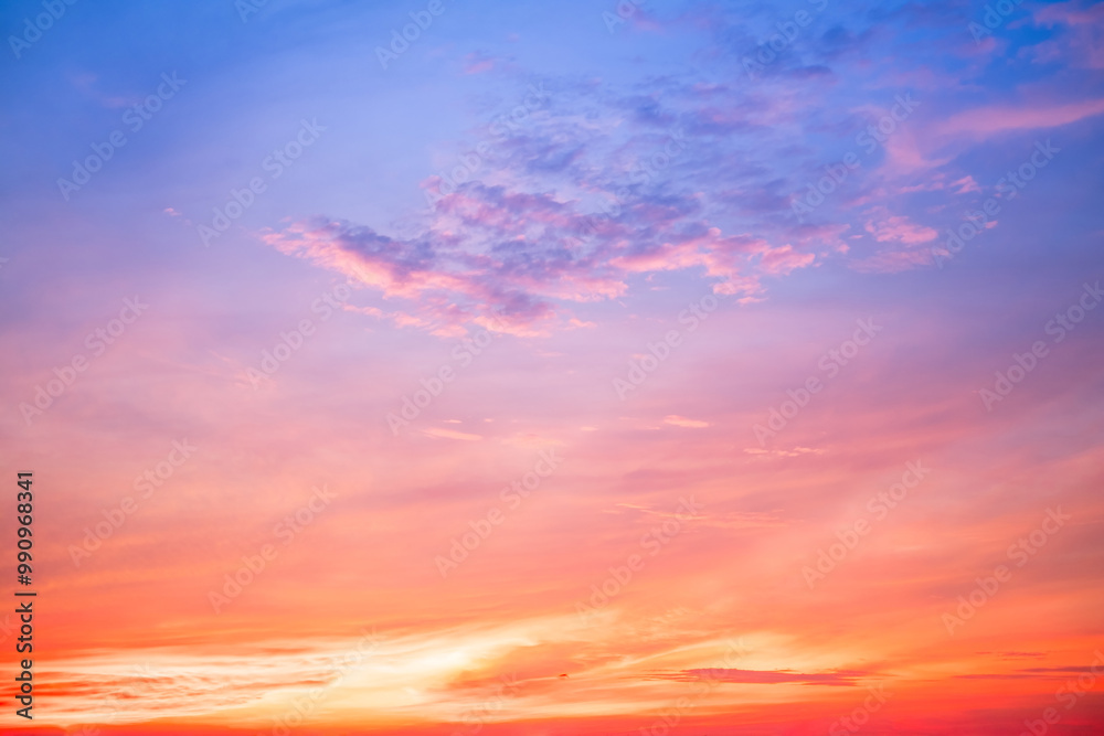 Fototapeta premium Beautiful , luxury soft gradient orange gold clouds and sunlight on the blue sky perfect for the background, take in everning,Twilight, Large size, high definition landscape photo