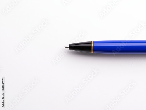 Minimalistic Blue Ballpoint Pen on White Surface - Elegant Writing Instrument for Creativity and Precision