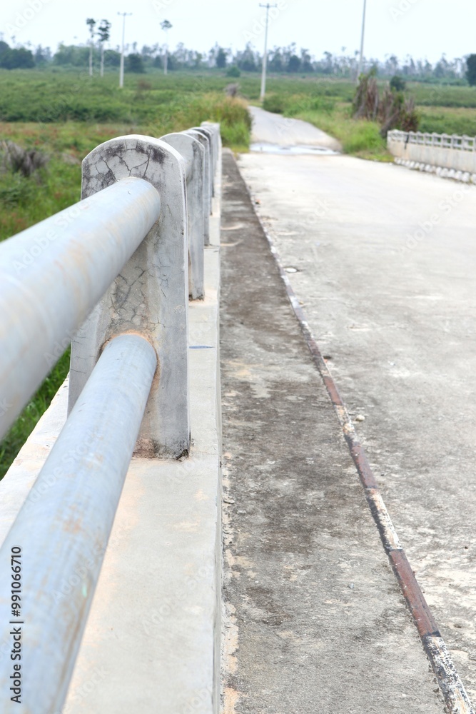 Concrete Bridge Over a Rural Landscape, Pathway to the Horizon, Serenity Concrete Bridge Over a Rural Landscape, Pathway to the Horizon, Serenity