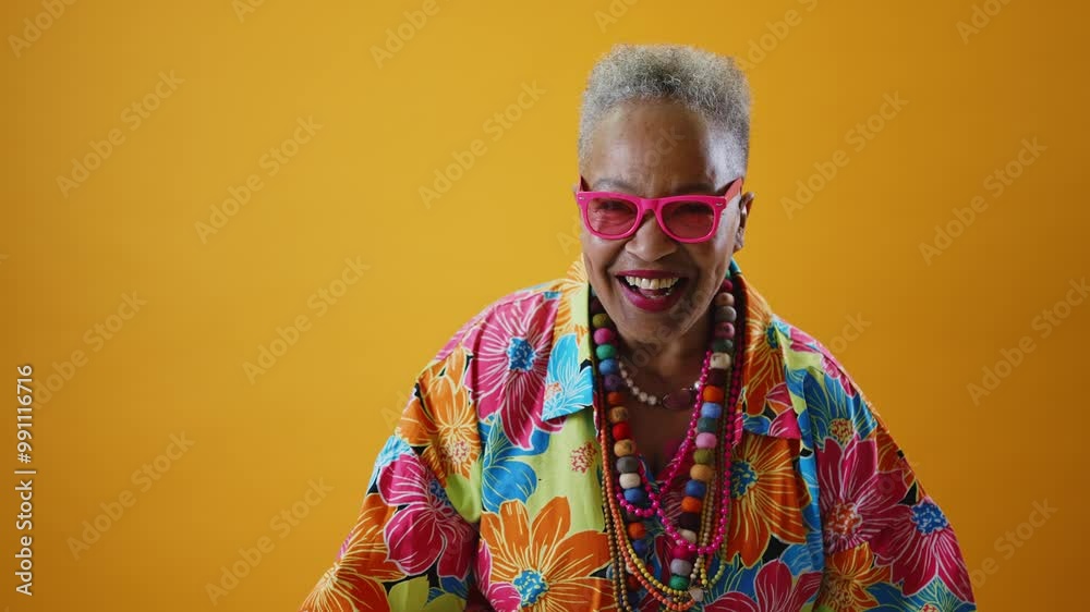 Cinematic video of a senior woman wearing fashionable clothes acting in studio on backdrops. Old woman smiling to camera. Cinematic video of a senior woman wearing fashionable clothes acting in studio on backdrops. Old woman smiling to camera.
