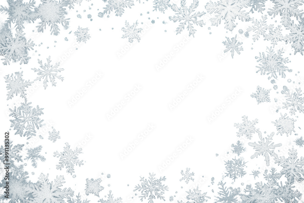 Festive frame made of snowflakes isolated on transparent background. Border with copy space. Winter wallpaper