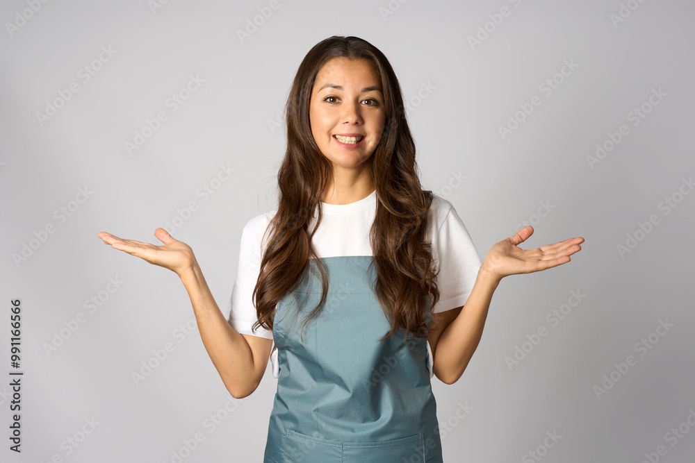 Portrait of woman barista standing with open hands Portrait of woman barista standing with open hands