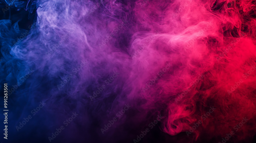 Fototapeta premium Bright red and purple smoke blending on a stage, adding intensity and richness