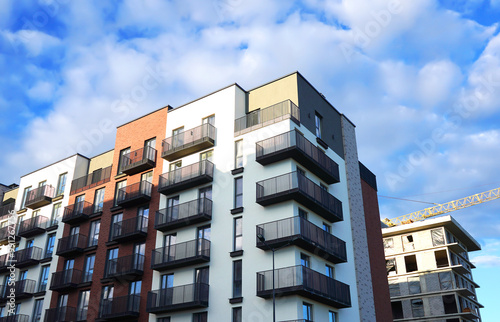 Modern facade building. Skyscraper facade. Modern High rise residential facade. Windows of Skyscraper. Architecture building exterior, window house block. Building construction.