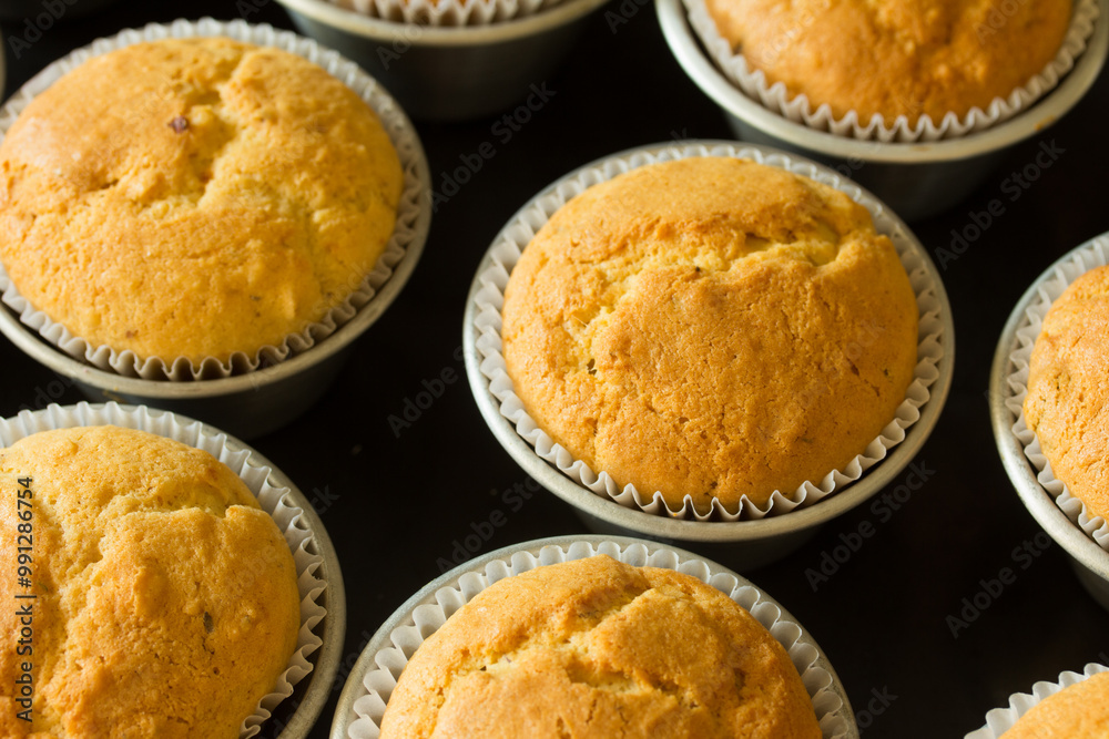 Group photo of muffins fresh from the oven. Group photo of muffins fresh from the oven.