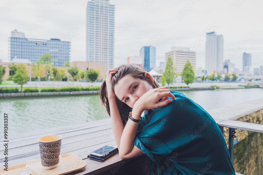 person drinking coffee in the city person drinking coffee in the city