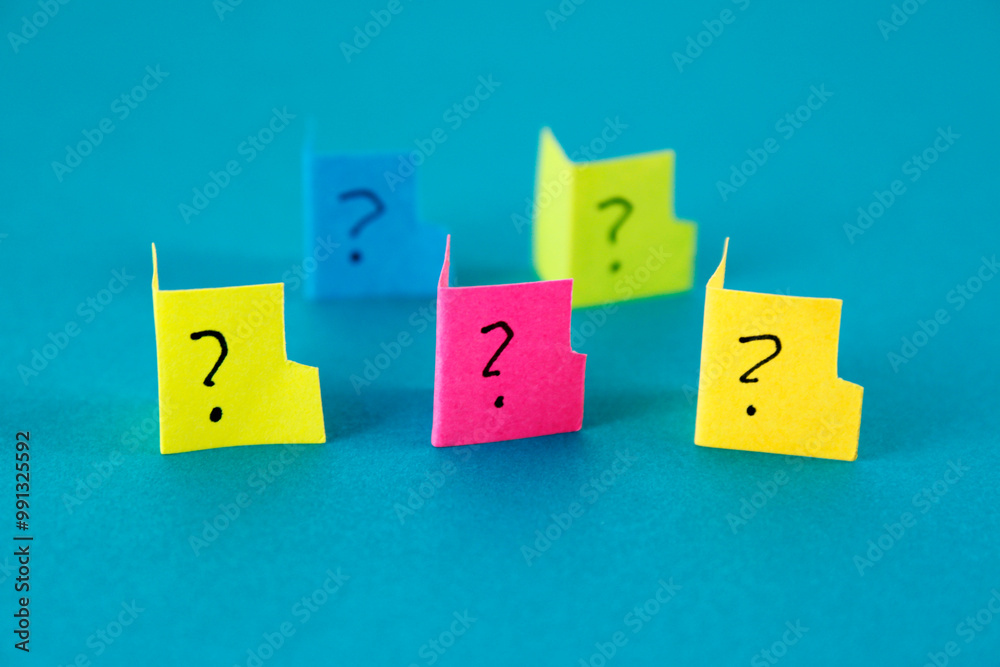Group of colorful folders with question marks Group of colorful folders with question marks