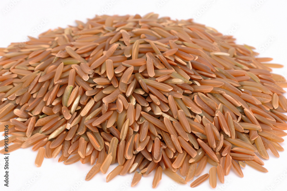 White with brown rice and green beans. food healthy grain concept. handful of brown rice on a white . a handful of rice is on a white with a green lifestyle and brown border. White with brown rice and green beans. food healthy grain concept. handful of brown rice on a white . a handful of rice is on a white with a green lifestyle and brown border.