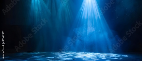 Blue Light Beams Illuminating Stage Background