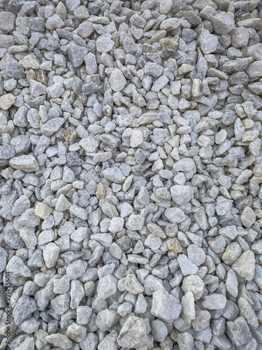  Small stones or a decorative grey rocks as texture. Garden gravel background