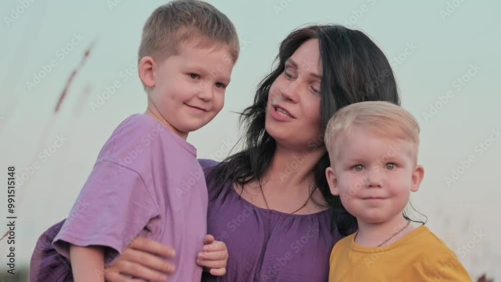 happy family, pregnant mother and children on a walk in the summer playing outside in a field. High quality FullHD footage happy family, pregnant mother and children on a walk in the summer playing outside in a field. High quality FullHD footage