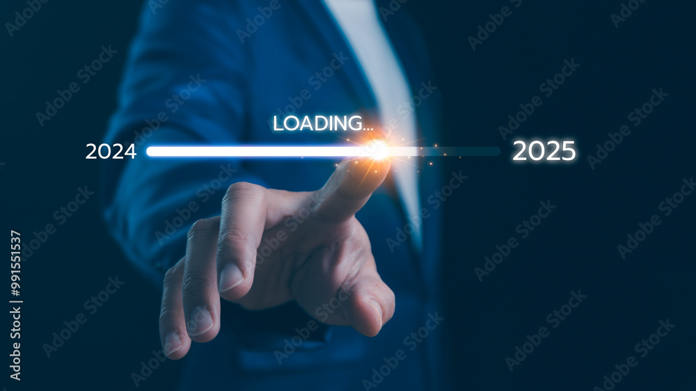 Businessman touch on loading progress from 2024 to 2025, Planning and challenge strategy in new year 2025 Concept. New business startup in 2024. New year 2025 loading, calendar date, end of the year.