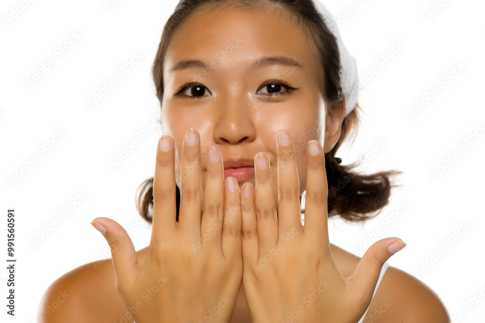 happy asian woman shows her natural nails without nail polish. happy asian woman shows her natural nails without nail polish.