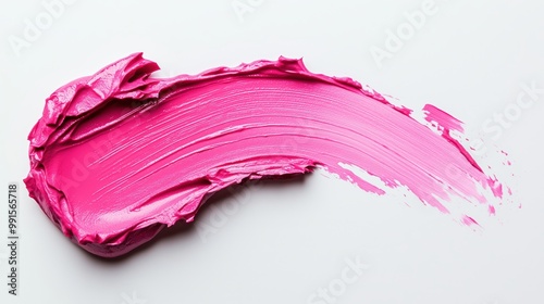 A vibrant pink brushstroke is displayed on a white background, showcasing the smooth texture and bold color, symbolizing creativity and artistic expression. photo