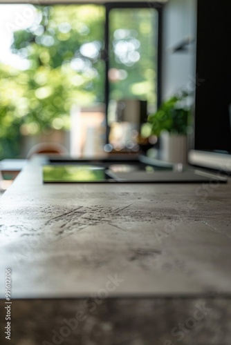 Wallpaper Mural A person is working on a tablet computer placed on a wooden table Torontodigital.ca