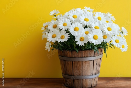 Beautiful white daisy flowers in a wooden pot on a wooden table with yellow background -.geneative ai