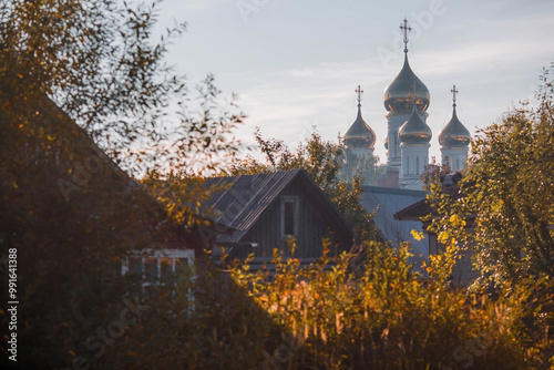 Beautiful landscape. The Russian countryside. Village houses and St. Nicholas Monastery at dawn in autumn. Russia, Pereslavl-Zalessky. photo