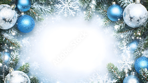 Christmas decorations view on the winter window background, blue silver and light blue balls, top of frame, 