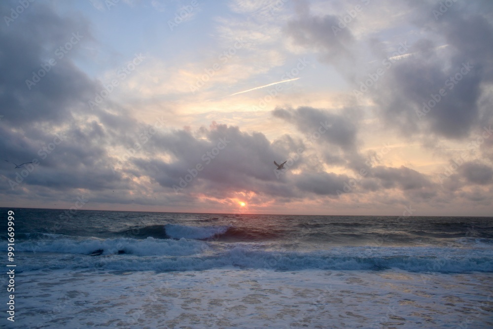 Obraz premium Sunrise at the beach 