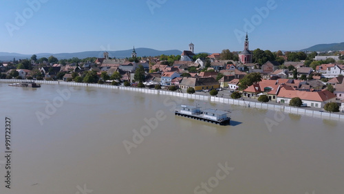 
European flood aerial view: Szentendre (Hungary) mobile flood protection walls defend.