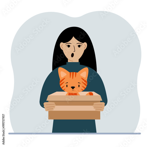 A woman is holding a cardboard box with a beautiful ginger cat. The concept of rescue, help and care for pets.