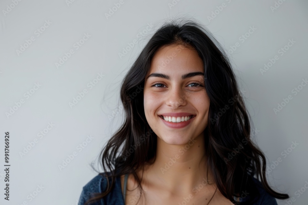 Dark brown haired woman posing on a white background, highlighting hair color. Dark brown haired woman posing on a white background, highlighting hair color.