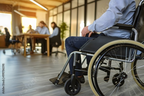 A person using a motorized wheelchair in a business meeting, modern office, inclusive environment, professional atmosphere