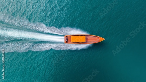 Wallpaper Mural Aerial View of a Vibrant Boat Cutting Through Water Torontodigital.ca