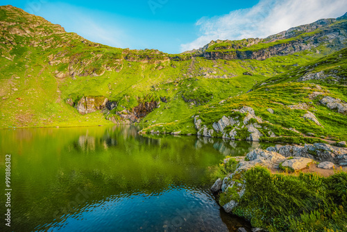 Fagaras mountains with Balea lake on Transfagarasan serpentine road in Sibiu County, Romania.