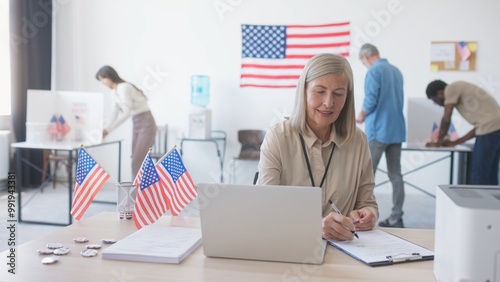 American citizens visiting local polling station. Smiling woman meeting voters while sitting at table with laptop. Poll worker checking documents and giving voting forms. Choosing president.