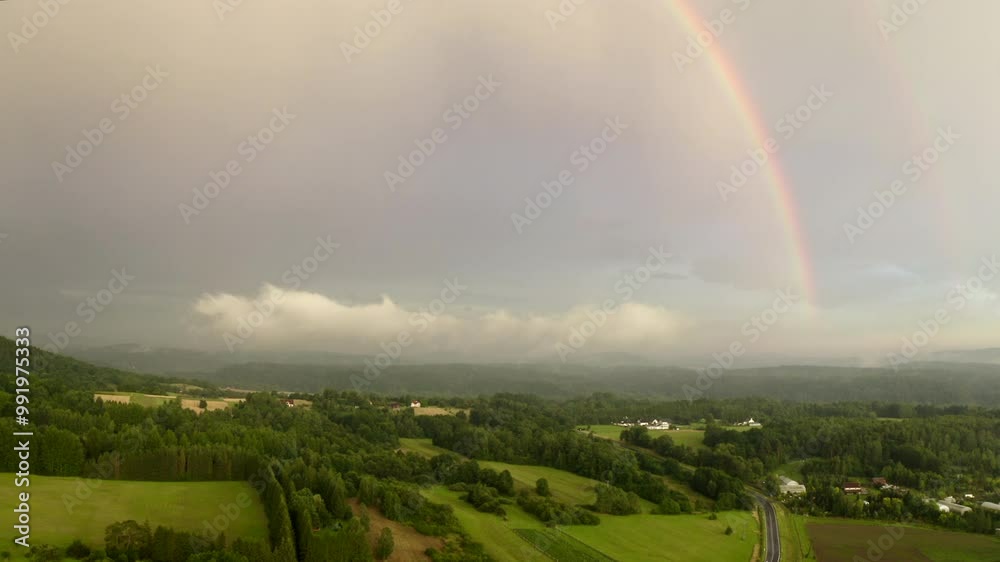 Magical rainbow over a misty countryside landscape. Enchanted forests, rolling green fields, distant hills, cloud layers, soft light, golden hour, rainy, atmospheric. Bieszczady, Poland Magical rainbow over a misty countryside landscape. Enchanted forests, rolling green fields, distant hills, cloud layers, soft light, golden hour, rainy, atmospheric. Bieszczady, Poland