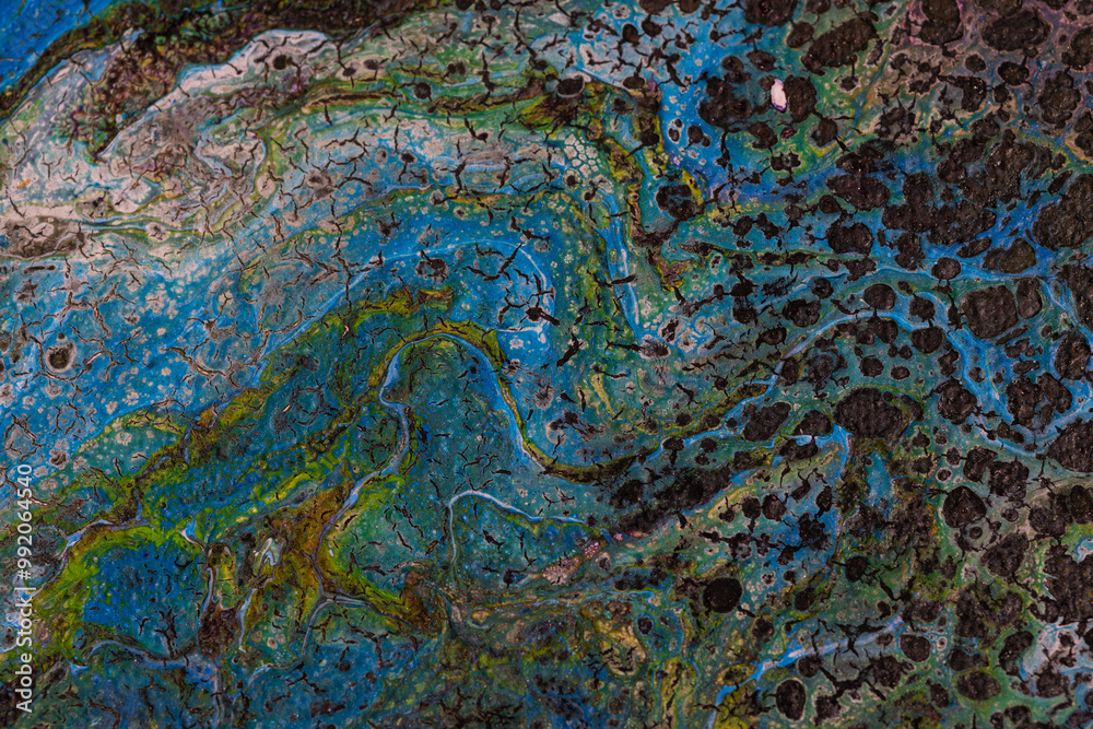 Abstract blue and green pattern with texture resembling marbled ...