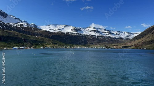 Wallpaper Mural Seyðisfjörður, Múlaþing, Iceland - farm fishing town on a sunny day as seen from a boat on a sunny day Torontodigital.ca