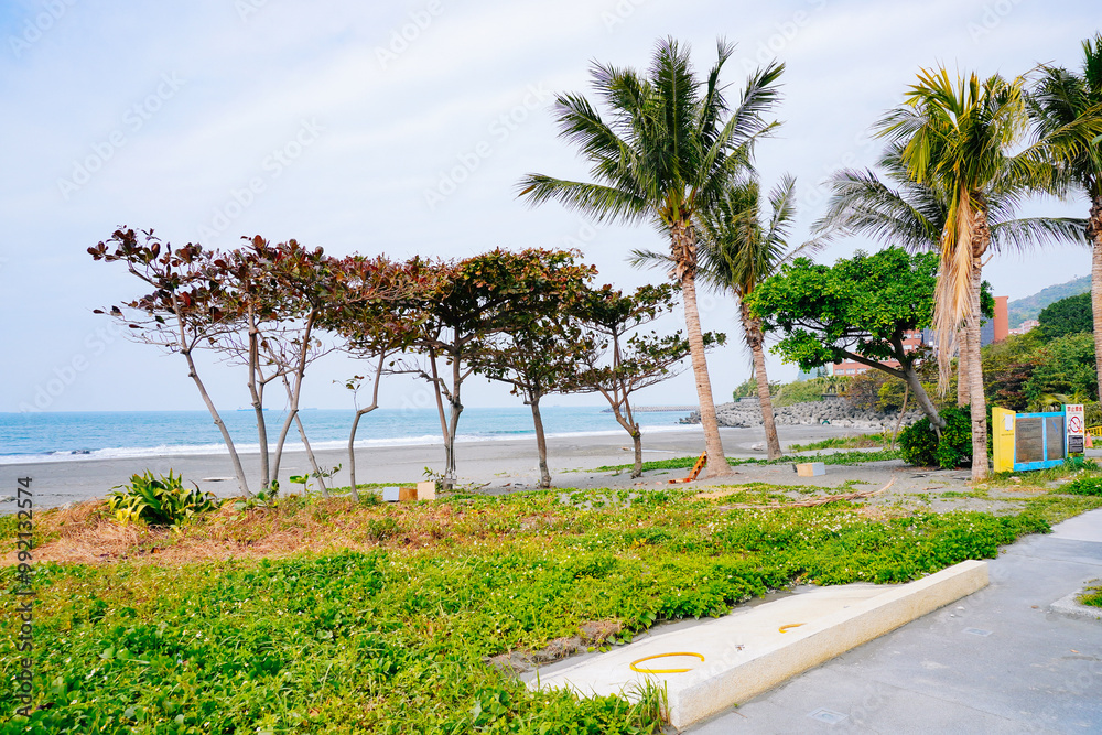 Fototapeta premium Kaohsiung, Taiwan, Republic of China, 01 25 2024: The landscape of Kaosiung Sizihwan Bay beach in Kaohsiung 
