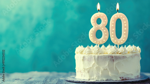 Eightieth birthday cake with cream icing and lit candles in shape of 80 bright background years

