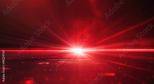 Red background with a bright red light shining on it. The light is creating a sense of movement and energy photo