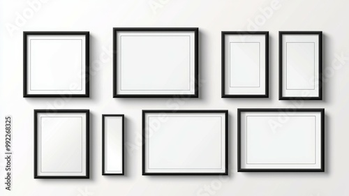 A collection of black framed white pictures