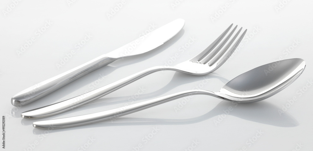 Cutlery set with Fork, Knife and Spoon on white background Cutlery set with Fork, Knife and Spoon on white background