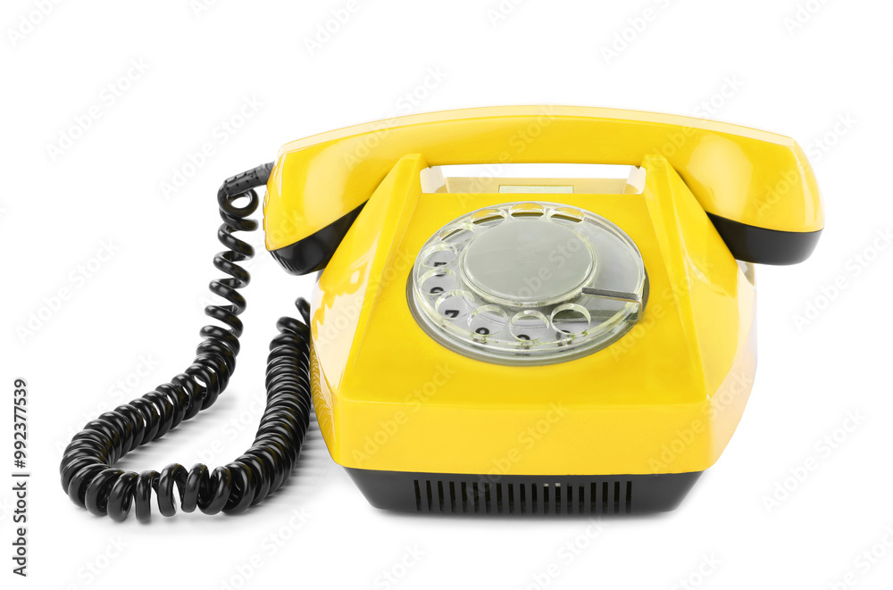 Old yellow telephone with rotary dial isolated on white Old yellow telephone with rotary dial isolated on white