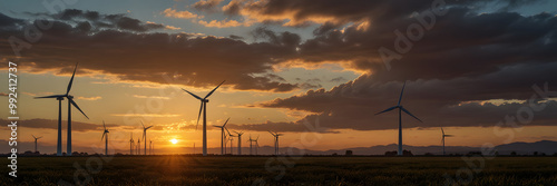 Eolic Wind Turbines Energy Supplies Electricity to a Beach City. Distribution of Clean and Sustainable Energy Power photo