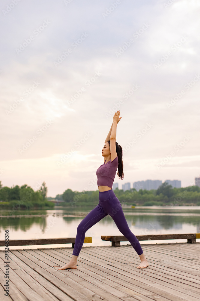 Young Woman Doing Yoga In A Park Young Woman Doing Yoga In A Park