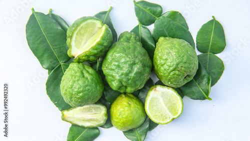 Fotografie Citrus hystrix DC or kaffir lime or bergamot whole on isolated white background