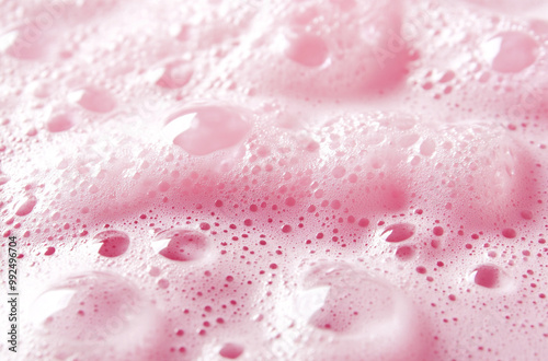 Close-up of pink sponge texture background with bubbles